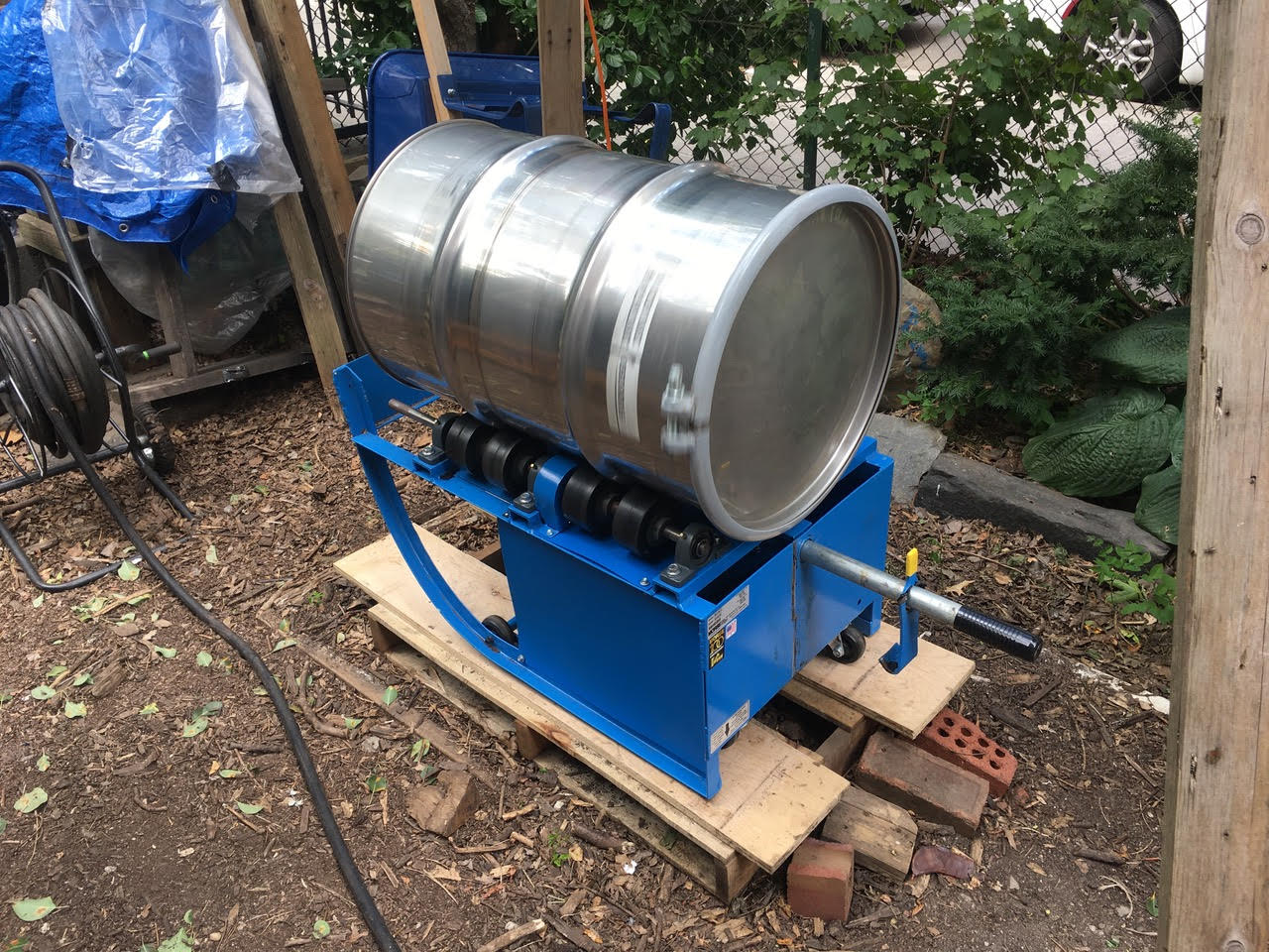 A close-up of our Bokashi rotator - a metal keg placed sideways on a platform which causes the keg to rotate continuously